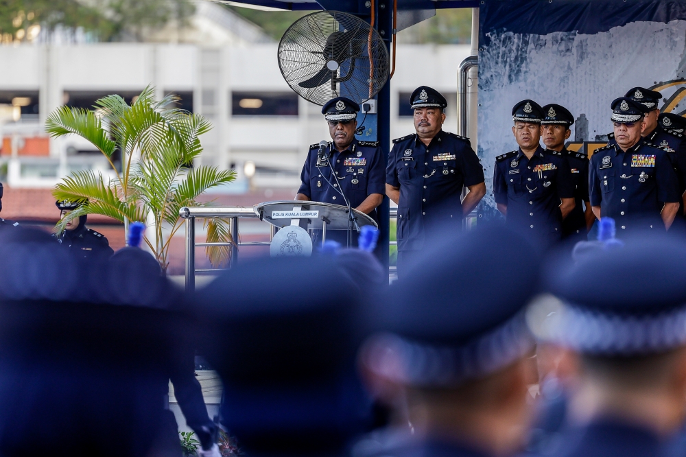 Kuala Lumpur police chief Datuk Allaudeen Abdul Majid speaks during the city police monthly gathering at the Kuala Lumpur Contingent Police Headquarters February 14, 2024. — Bernama pic