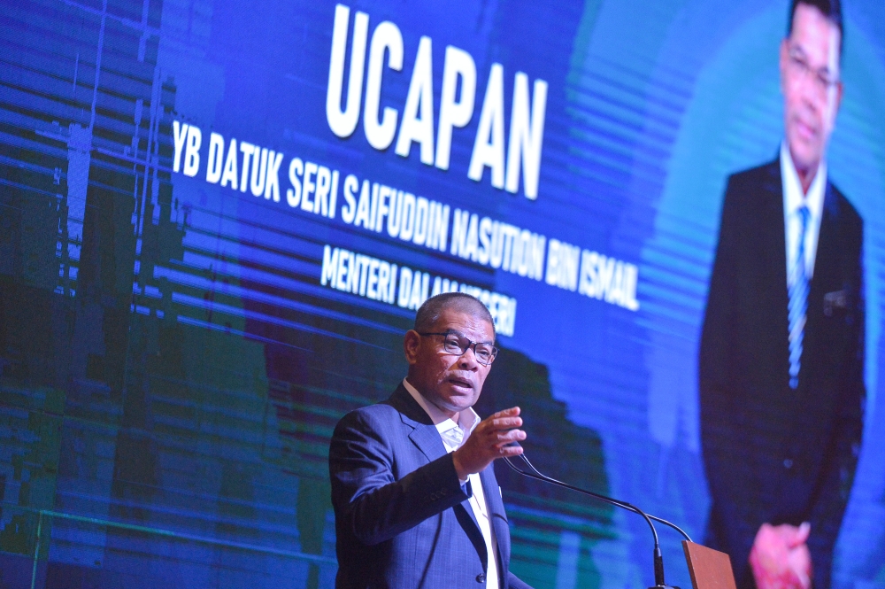 Home Minister Datuk Seri Saifuddin Nasution Ismail delivers his speech during the Home Ministry’s monthly assembly at the Setia Perkasa Complex in Putrajaya February 14, 2024. — Picture by Shafwan Zaidon 