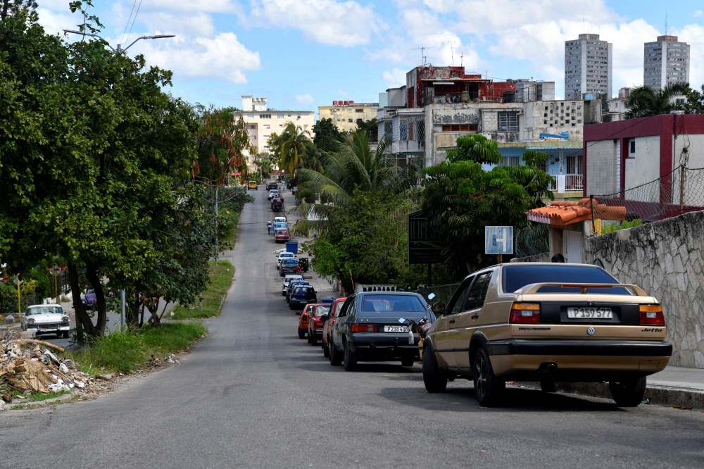 Drivers queue to buy gasoline at a petrol station, in Havana, Cuba, February 11, 2024. — Reuters pic