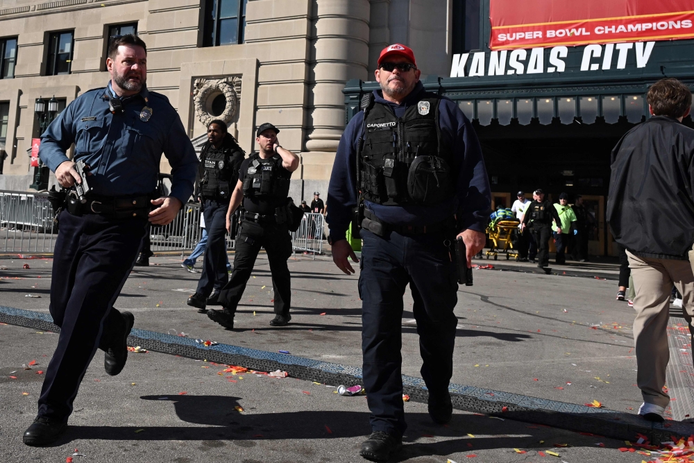 One person was killed and 21 people including children were injured in a shooting at the Kansas City Chiefs’ Super Bowl victory rally yesterday. — AFP pic