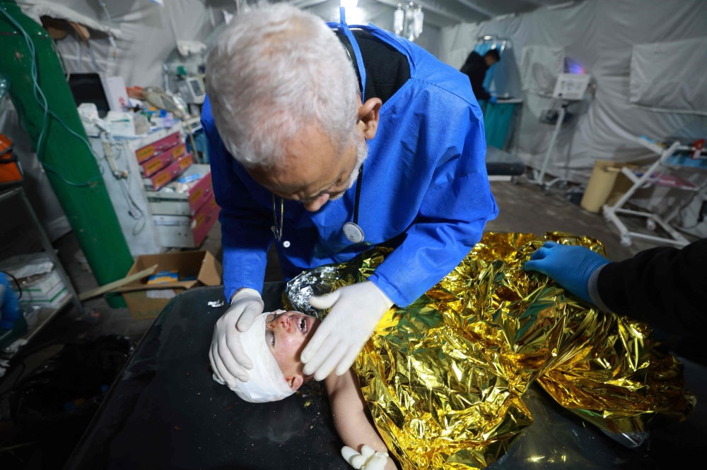 In Israel’s retaliatory military offensive in Gaza at least 28,576 people, mostly women, children and adolescents have been killed, according to the health ministry in Gaza. — AFP pic