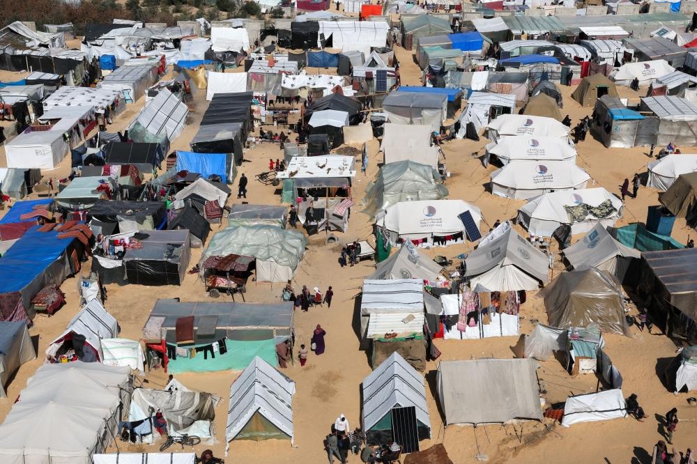 Displaced Palestinians take shelter in a tent camp in Rafah. — Reuters pic