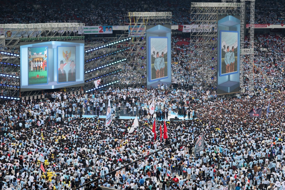 Prabowo Subianto and his running mate Gibran Rakabuming Raka, attend their campaign rally in Jakarta. — Reuters pic