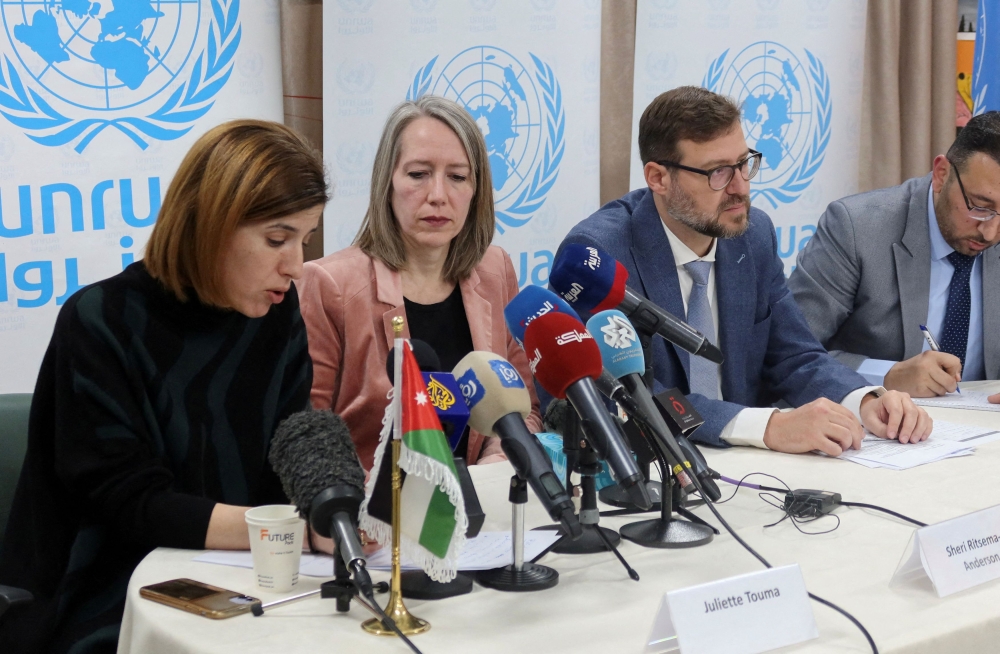 UNRWA Director of Communications, Juliette Touma, attends a press conference with United Nations resident coordinator, Sheri Ritsema-Anderson and director of the UN Relief and Works Agency, Olaf Becker at Amman new camp also known as al Wihdat camp for Palestinian refugees, in Amman, Jordan February 13, 2024. — Reuters pic