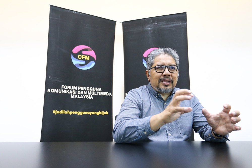 CFM chairman Megat Ishak Maamunor Rashid speaks during an interview at MCMC, Cyberjaya on February 14, 2024. — Picture by Miera Zulyana