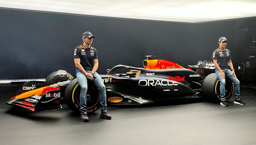 Red Bull's Max Verstappen and Sergio Perez during the new car launch. — Reuters pic
