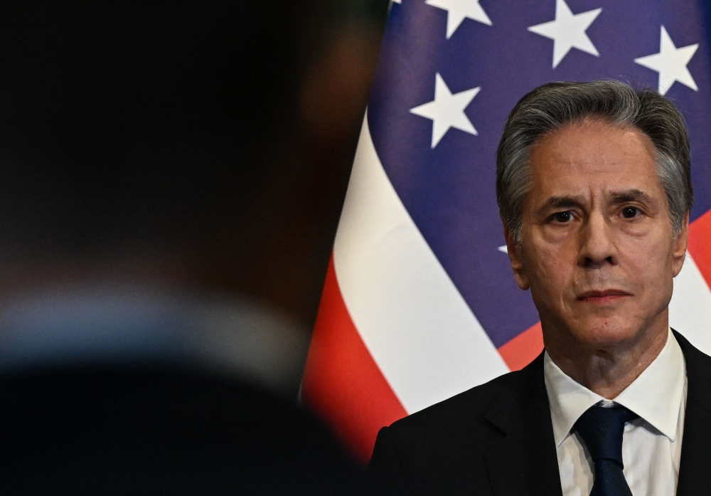 US' Secretary of State Antony Blinken looks on next to an American flag during a press conference with Albania's Prime Minister in Tirana on February 15, 2024. — AFP pic