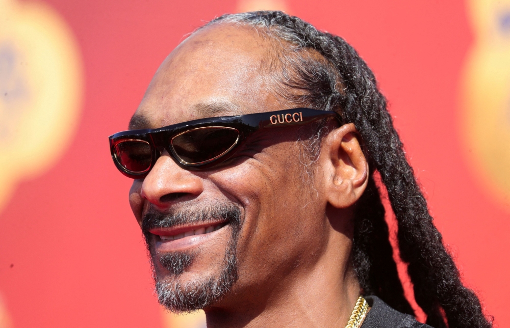 American rapper Snoop Dogg arrives for the MTV Movie & TV Awards at Barker Hangar in Santa Monica, California June 5, 2022. — Reuters pic