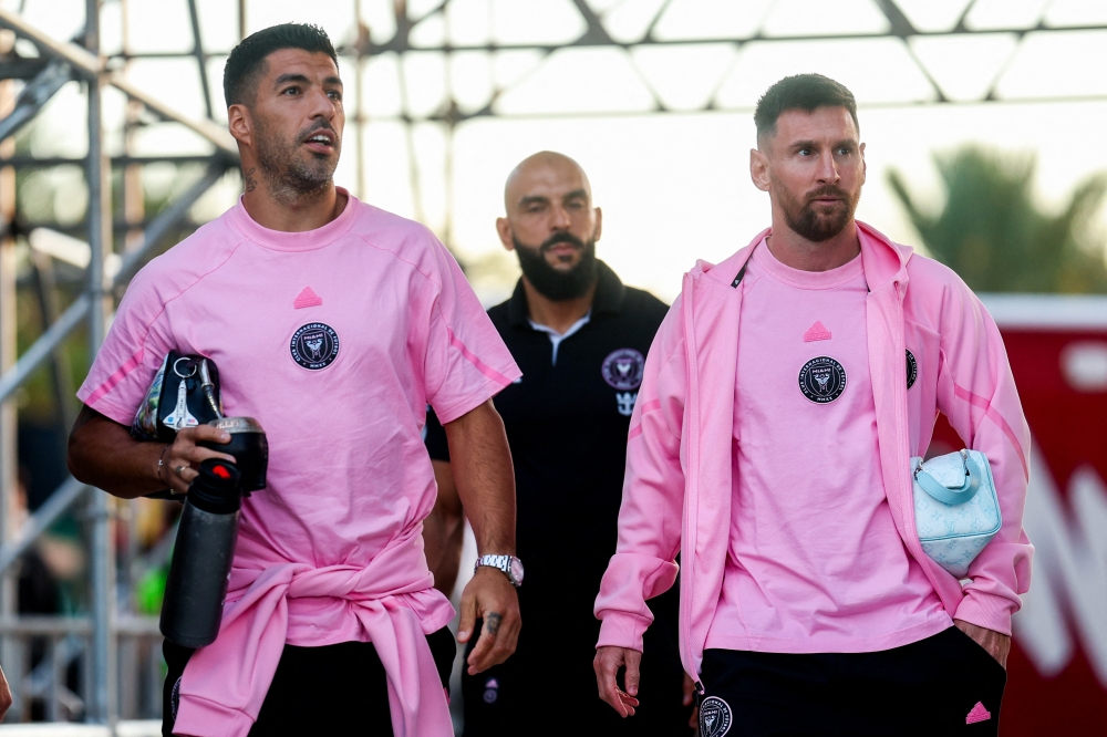 Inter Miami CF forward Lionel Messi and Inter Miami CF forward Luis Suarez arrive for a game against the Newell's Old Boys at DRV PNK Stadium. —  Nathan Ray Seebeck-USA TODAY Sports pic