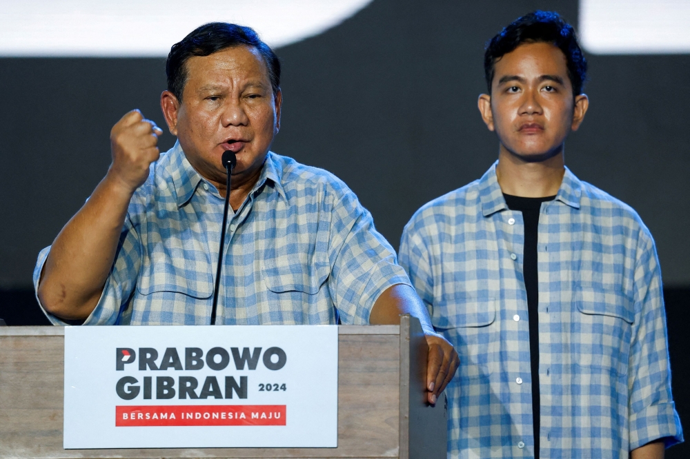 Indonesia's Defence Minister and leading Presidential candidate Prabowo Subianto with his running mate Gibran Rakabuming Raka in Jakarta, Indonesia February 14, 2024. ― Reuters pic