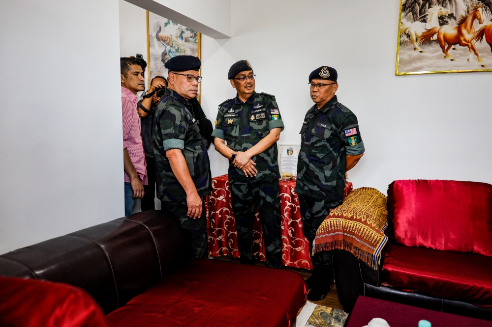 Home Minister Datuk Seri Saifuddin Nasution Ismail (left) visits police quarters at Briged Tengah (PGA) Cheras, February 16, 2024. — Picture by Hari Anggara