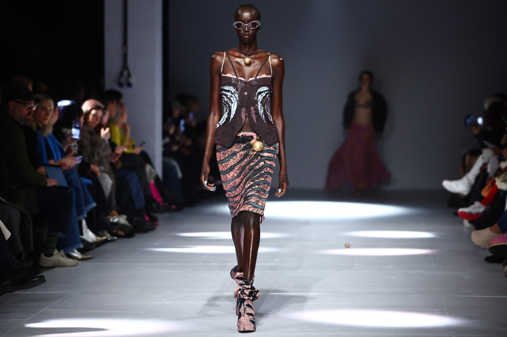 A model presents a creation by London-based Ukrainian designer Masha Popova during a catwalk presentation of her Autumn/Winter 2024 collection during London Fashion Week in London February 16, 2024. — AFP pic