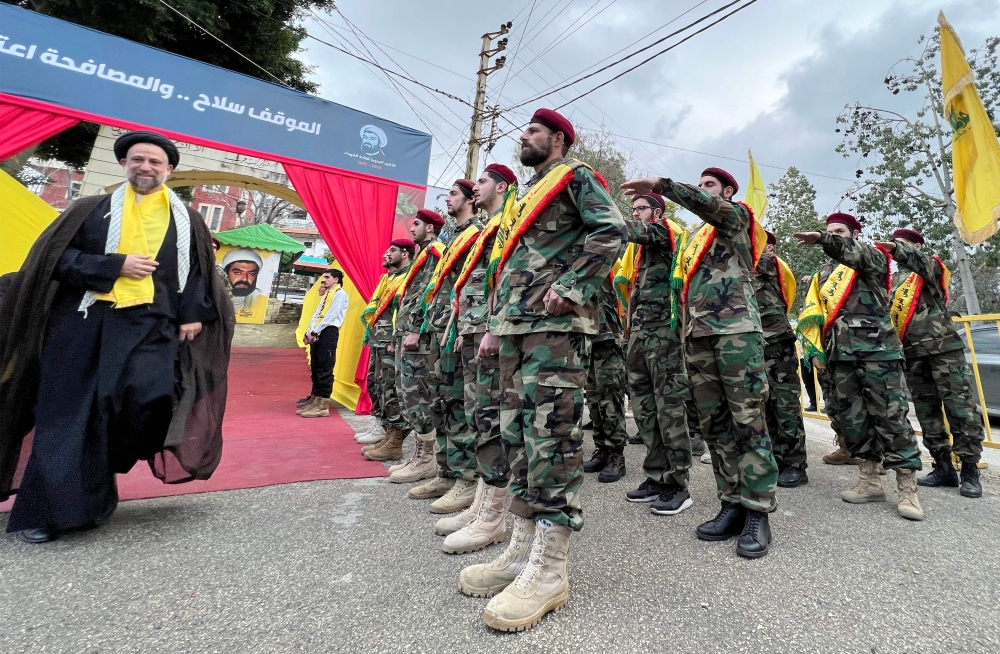 Fighters of the Lebanese Shiite group Hezbollah take part in a ceremony to commemorate the party's fallen leaders in the Lebanese village of Jibshit, about 50 kilometres south of the capital Beirut on February 15, 2024. ― AFP pic