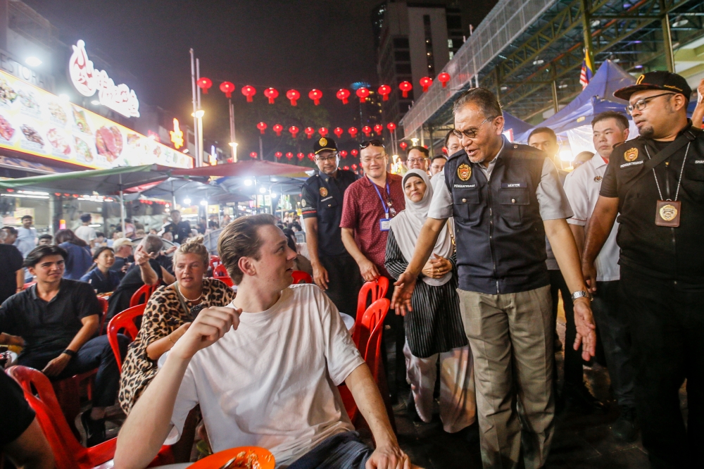 Health Minister Datuk Seri Dzulkefly Ahmad during a walkabout at Jalan Alor, Bukit Bintang, February 17, 2024. — Picture by Hari Anggara