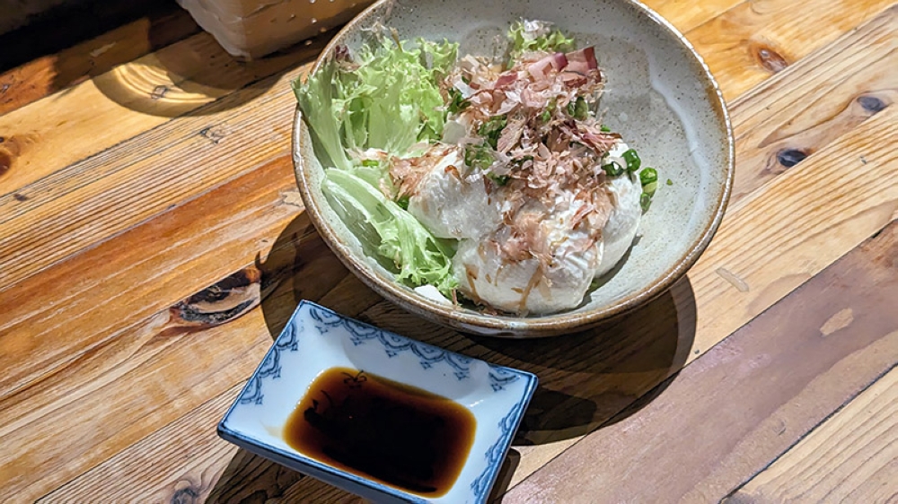 Hiyayakko, Japanese chilled tofu topped with plenty of bonito and soy sauce on the side.