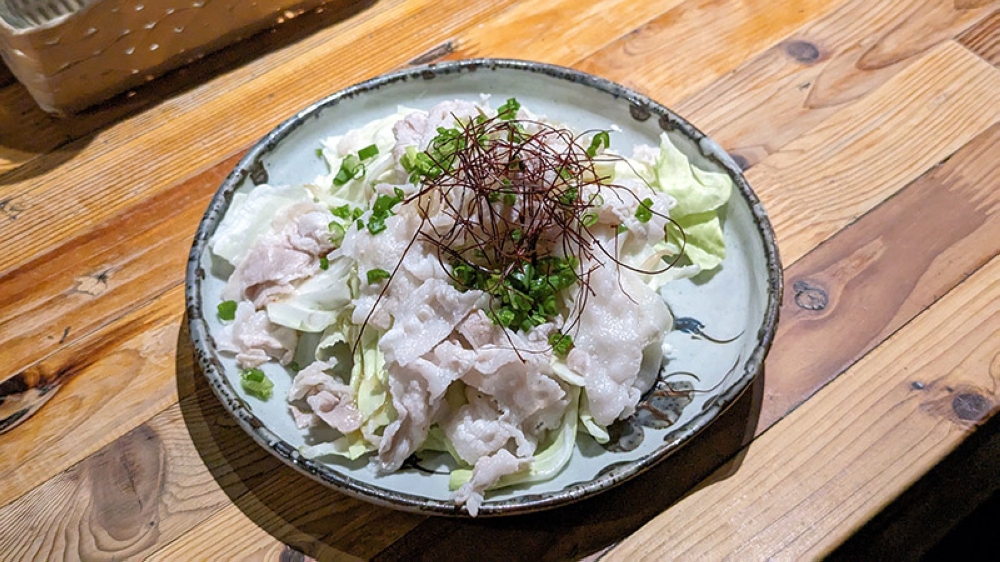 Pork Shabu-shabu and Cabbage Salad came with razor-thin slices of soft pork belly paired with crunchy slivers of cabbage and bean sprouts, drizzled with a tangy 'ponzu' dressing.