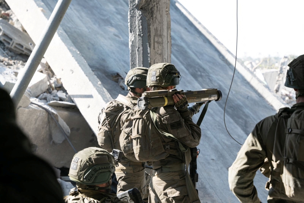 Israeli soldiers operate in the Gaza Strip. — Reuters pic