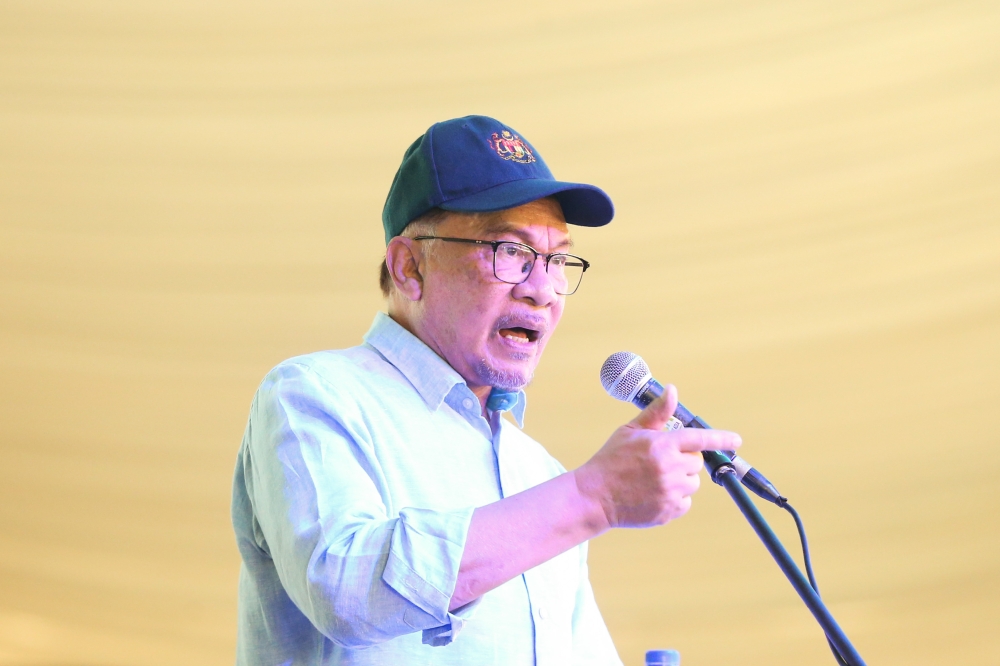 Prime Minister Datuk Seri Anwar Ibrahim speaks during Karnival MAIWP 2024 in Taman Tasik Titiwangsa, February 18, 2024. — Picture by Miera Zulyana