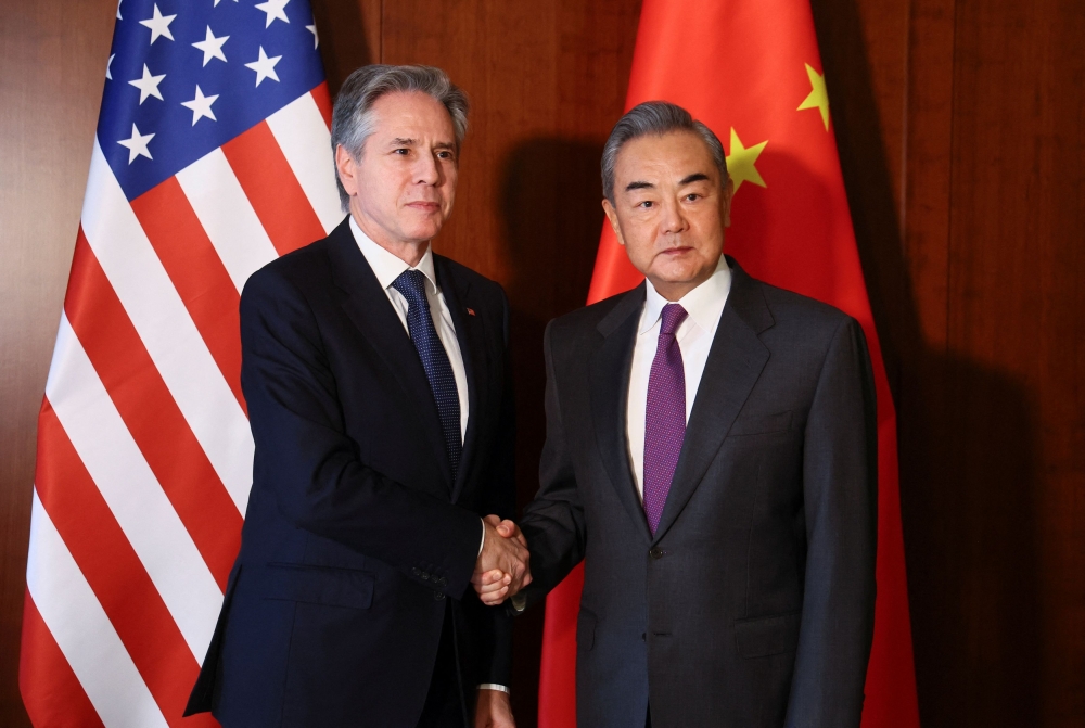 Washington should lift sanctions on Chinese companies and individuals, and that attempts to de-couple from China would only hurt the United States, China’s Foreign Minister Wang Yi told US Secretary of State Antony Blinken. — Reuters pic