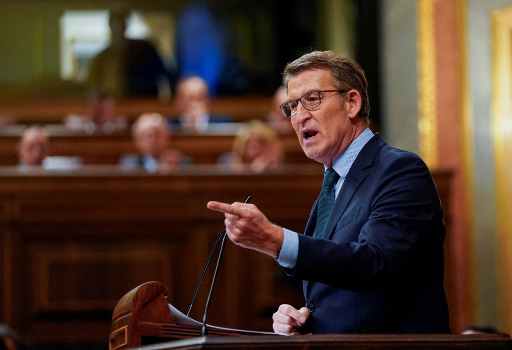 People's Party leader Alberto Nunez Feijoo speaks during a debate on the legislative proposal to grant amnesty to those involved in Catalonia's failed independence bid in 2017, in Madrid, Spain,  January 30, 2024. — Reuters pic