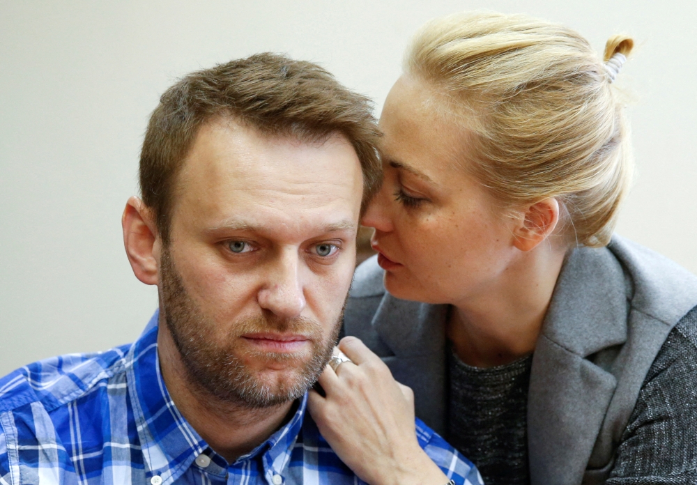 The late Russian opposition leader Alexei Navalny is seen here with his wife Yulia as they attend a hearing at the Lublinsky district court in Moscow, Russia, April 23, 2015. — Reuters pic