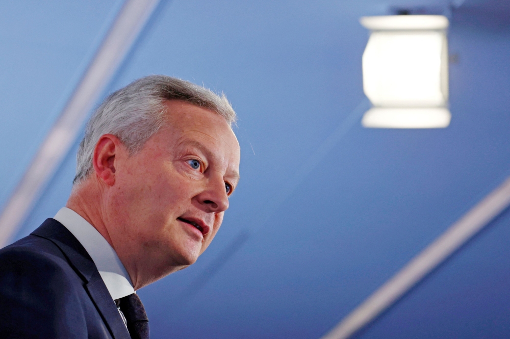 French Finance Minister Bruno Le Maire said that state spending would be cut by €10 billion across all departments and agencies. — Reuters pic
