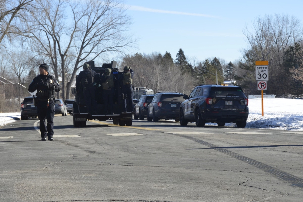 Law enforcement officers attend the scene of an incident in which police officers were killed while responding to an emergency call, according to local media, in Burnsville, Minnesota February 18, 2024 in this picture obtained from social media. — MN CRIME/MNCRIME.com/via Reuters pic