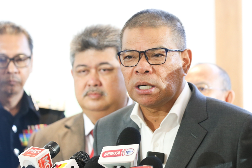 Home Minister Datuk Seri Saifuddin Nasution Ismail speaks to reporters in Putrajaya February 19, 2024. — Picture by Miera Zulyana