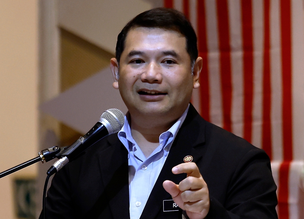 Economy Minister Rafizi Ramli (pic) called out former Umno Supreme Council member Isham Jalil and Datuk Mohd Puad Zarkashi and a political analyst who goes by Liam Sian See for constantly berating the government despite them being in a union with Umno. ― Bernama pic