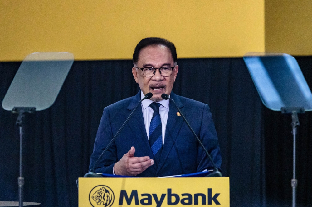 Prime Minister Datuk Seri Anwar Ibrahim speaks during a meet-and-greet session with Maybankers at Maybank Tower in Kuala Lumpur, February 19, 2024. — Picture by Firdaus Latif