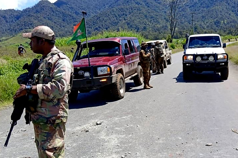 Papua New Guinea will give arrest powers to its military amid an eruption of tribal violence in remote highlands that saw at least 26 men killed in an ambush, Prime Minister James Marape said. — AFP pic/Royal Papua New Guinea Constabulary