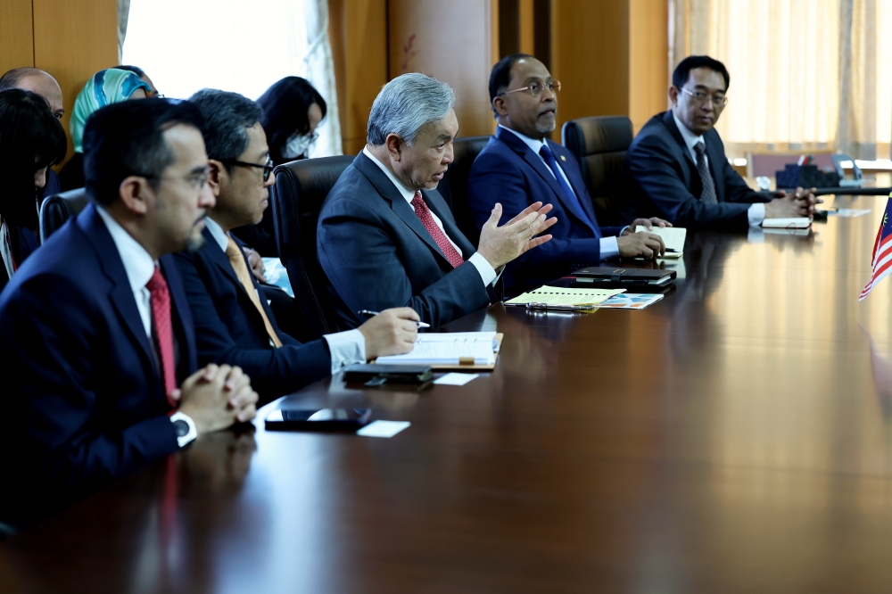Deputy Prime Minister and Minister of Rural and Regional Development, Datuk Seri Ahmad Zahid Hamidi during a meeting with the Japanese Minister of Education, Culture, Sports, Science and Technology (MEXT), Dr Masahito Moriyama, as well as a Technical and Vocational Education and Training (TVET) briefing session by MEXT, February 20, 2024. Also present is Higher Education Minister Datuk Seri Zambry Abd Kadir. — Bernama pic 