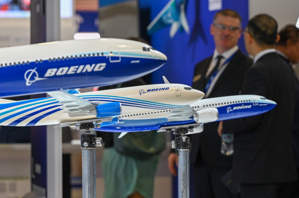 Miniature models of Boeing commercial airplanes are displayed at the Singapore Airshow in Singapore on February 20, 2024. — AFP pic