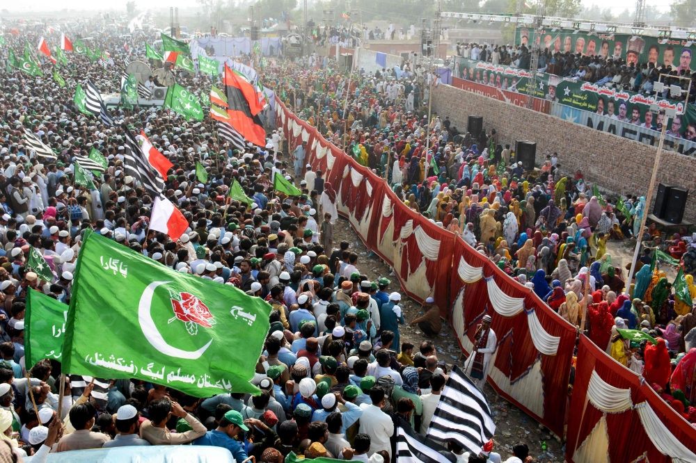 Supporters of the Grand Democratic Alliance (GDA) party protest against the alleged skewing in Pakistan’s general election results, at a national highway in Moro, Sindh province on February 20, 2024. — AFP pic