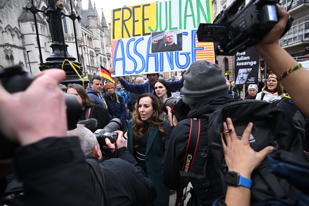 Arriving ahead of the two-day hearing, Assange’s wife Stella thanked a crowd of protesters. — AFP pic