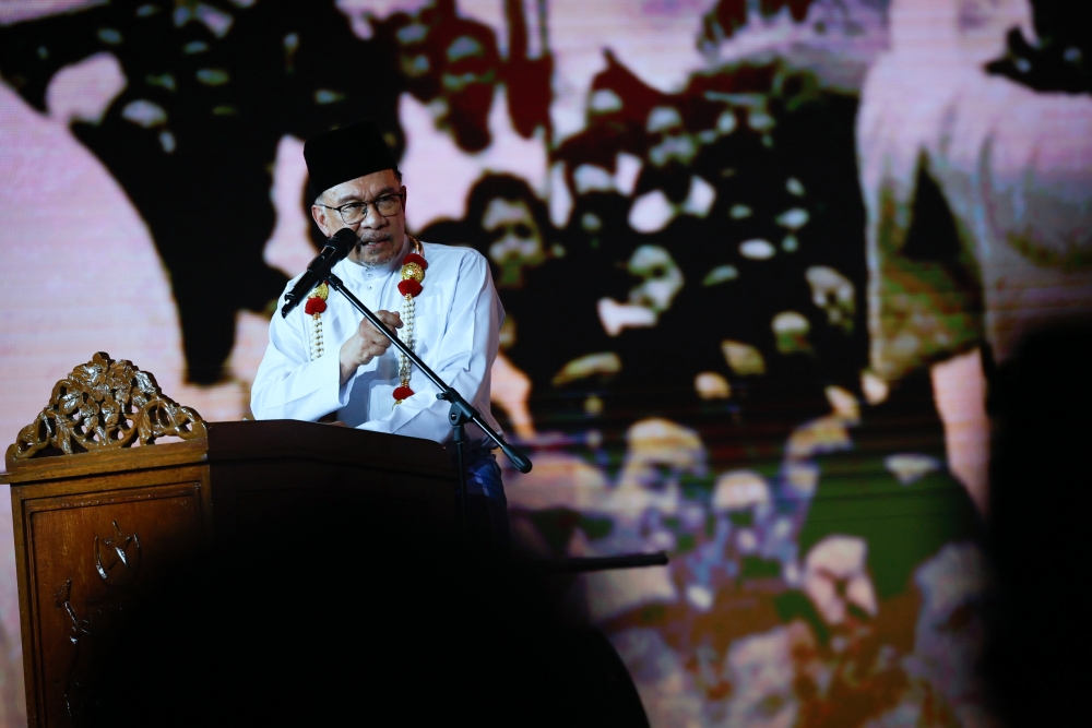 Prime Minister Datuk Seri Anwar Ibrahim speaks at the 68th Anniversary of the Independence Declaration of the Federation of Malaya celebration at the Proclamation of Independence Memorial in Banda Hilir, Melaka, February 20, 2024. — Bernama pic 