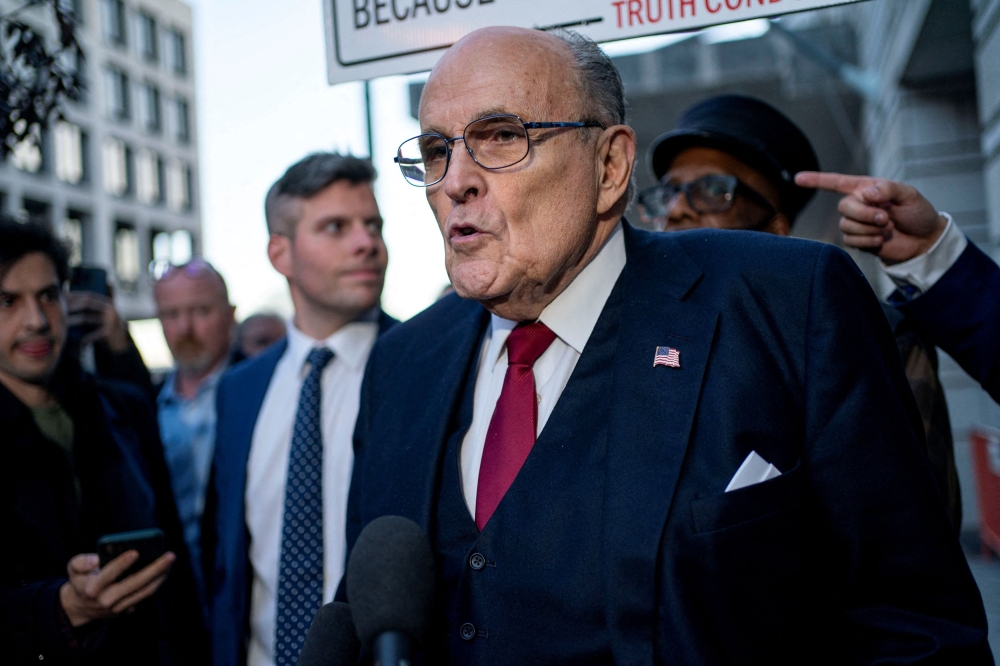 US Bankruptcy Judge Sean Lane entered a court order allowing Rudy Giuliani (pic) to seek a new trial and challenge the amount of damages awarded to Wandrea 'Shaye' Moss and her mother, Ruby Freeman, whom Giuliani had falsely accused of fraud after former Republican President Donald Trump’s 2020 election loss.  — Reuters pic