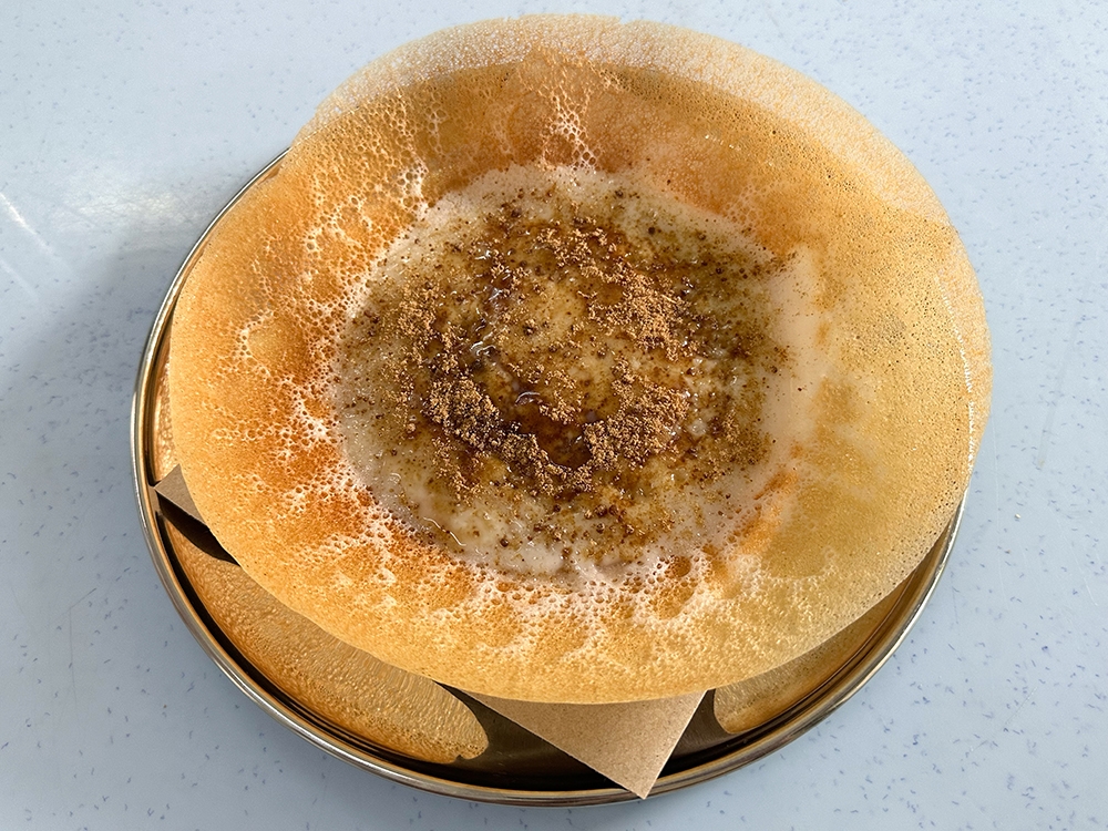 Sprinkle jaggery for a touch of sweetness and it helps temper out the richness of the Paal Appam