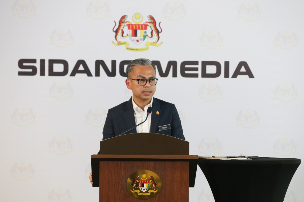 Communications Minister Fahmi Fadzil said the committees actually play the check-and-balance role in Parliament as they were made up of Members of Parliament from various parties. — Picture by Miera Zulyana