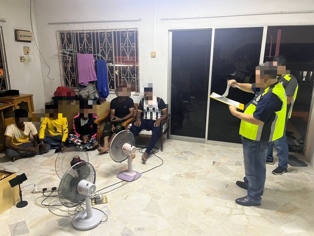 Johor Immigration enforcement officers round up undocumented migrants during a two-day statewide operation from February 19, 2024. — Picture courtesy of the Johor Immigration Department 