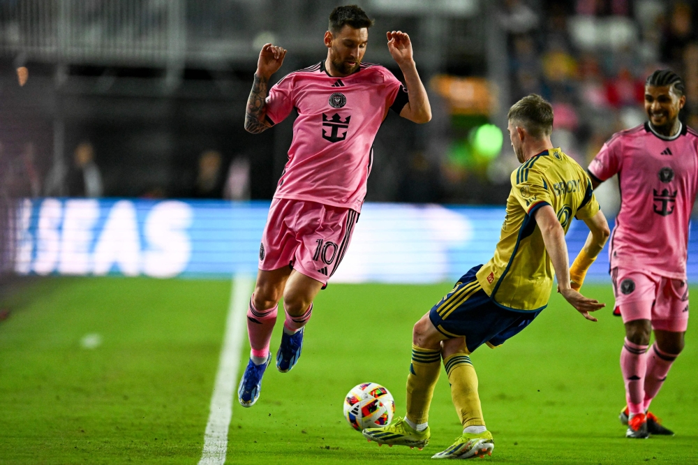 Inter Miami’s Argentine forward Lionel Messi fights for the ball with Real Salt Lake’s defender Andrew Brody during the MLS football match between Inter Miami and Real Salt Lake at Chase Stadium in Fort Lauderdale, Florida, February 21, 2024. — AFP pic 