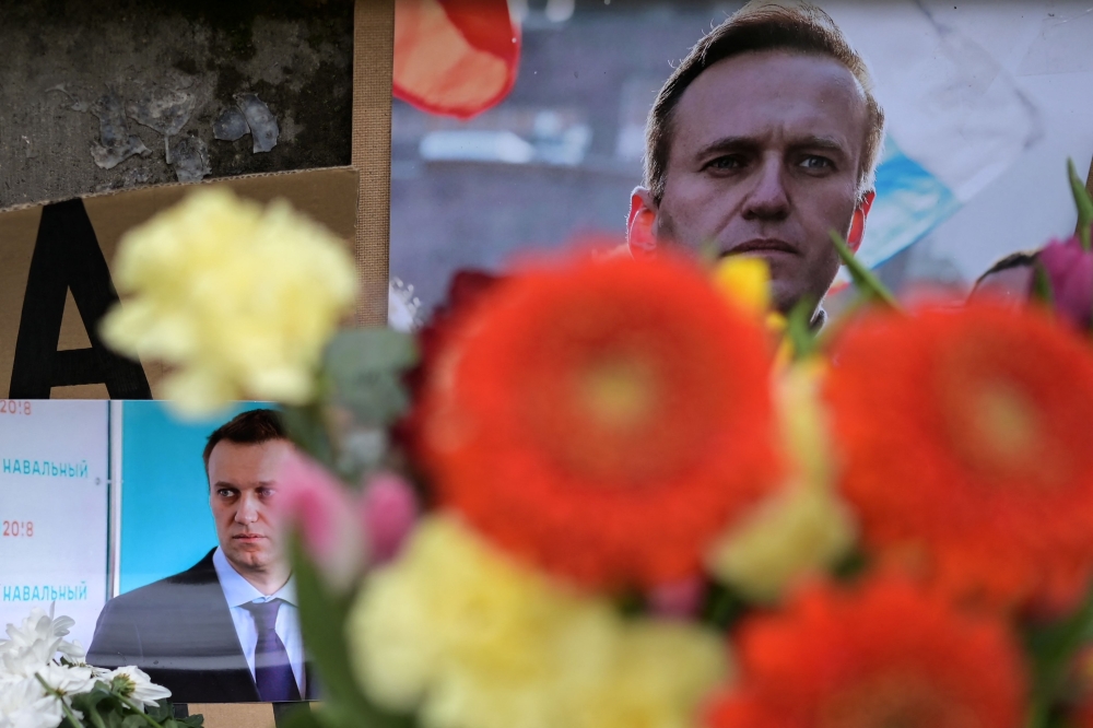 The mother of Russian opposition leader Alexei Navalny, who died in an Arctic prison last week, said yesterday officials were pressuring her to agree to a secret burial for her son. — AFP pic
