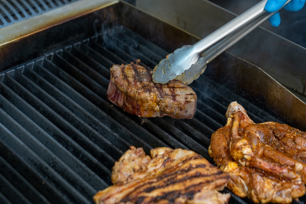 The steak is chargrilled in the kitchen