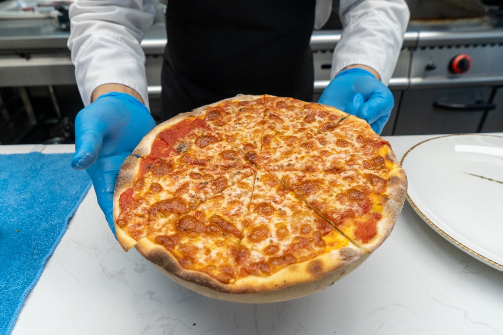 Tan's special yeast-free Margherita Pizza has a light, crispy base