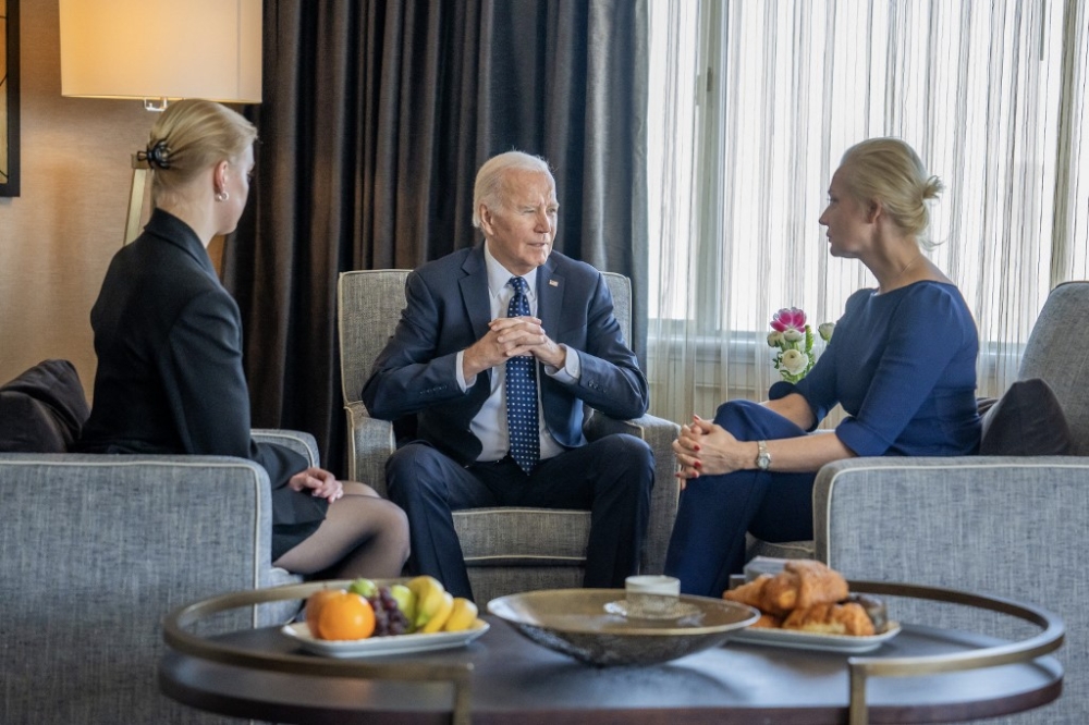 In this photo courtesy of The White House, obtained on February 22, 2024, US President Joe Biden (centre) meets with Yulia Navalnaya (right), widow of Kremlin opposition leader Alexei Navalny, who died last week in a Russian prison, and daughter Dasha Navalnaya (left) in San Francisco, California. — Handout / White House / AFP pic