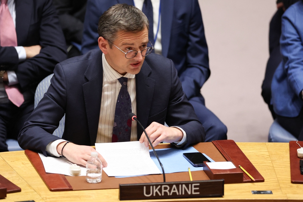 Ukrainian Foreign minister Dmytro Kuleba speaks during the UN General Assembly meeting on the ‘temporarily occupied territories of Ukraine’ marking the second anniversary of the Russian invasion, at the UN Headquarters in New York February 23, 2024. — AFP pic