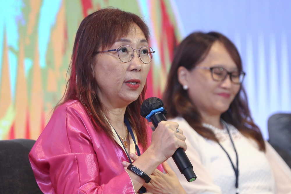 Seputeh MP Teresa Kok (left) speaks during the 2024 Woman's Right Conference at Asian International Arbitration Centre in Kuala Lumpur February 24, 2024. — Picture by Yusof Mat Isa