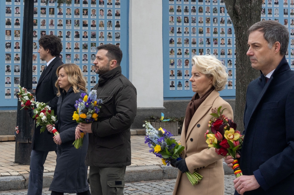Ukraine’s President Volodymyr Zelenskiy, European Commission President Ursula von der Leyen, Italian Prime Minister Giorgia Meloni, Belgium’s Prime Minister Alexander De Croo and Canada’s Prime Minister Justin Trudeau visit the Memory Wall of Fallen Defenders of Ukraine on the second anniversary of Russia’s invasion of Ukraine, Kyiv, February 24, 2024. — Reuters pic