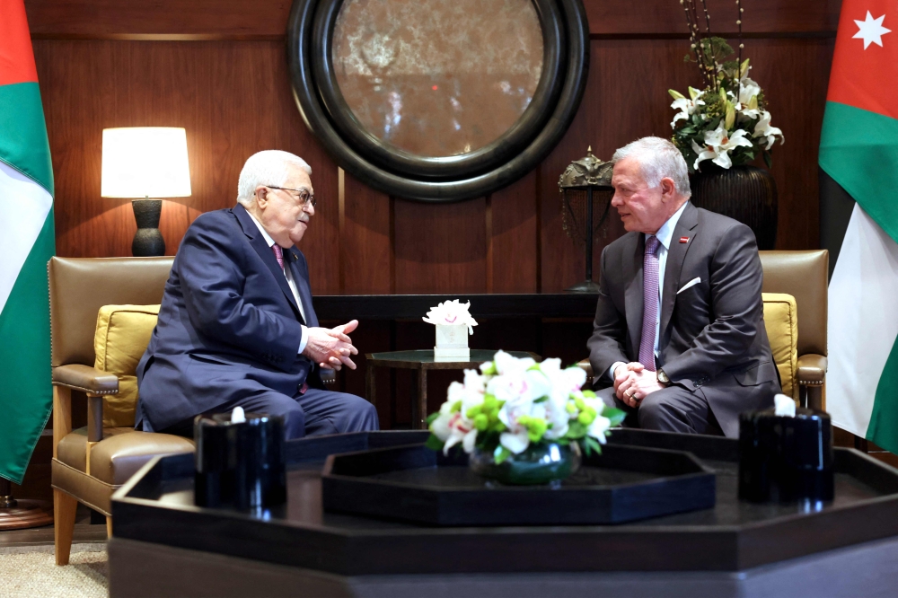 This handout picture provided by the Palestinian Authority's press office (PPO) shows President Mahmud Abbas (left) meeting with Jordan's King Abdullah II in Amman on February 25, 2024. — AFP / Handout PPO