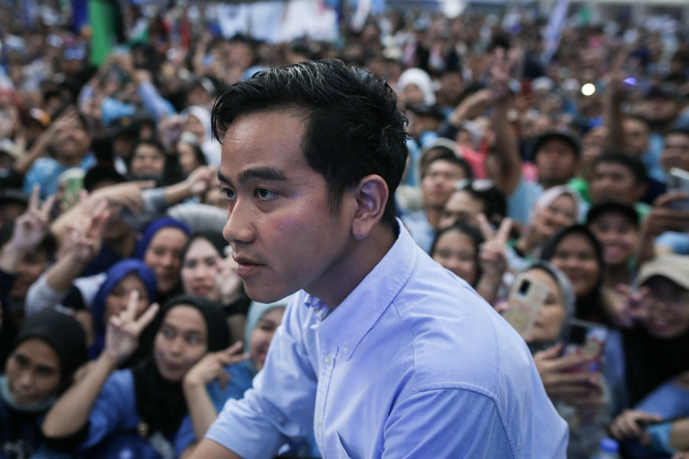 Vice presidential candidate Gibran Rakabuming Raka, Indonesian President Joko Widodo's son and current Surakarta City mayor, attends an election campaign at the Gelora Bandung Lautan Api Stadium in Bandung, West Java, on February 8, 2024. — AFP pic